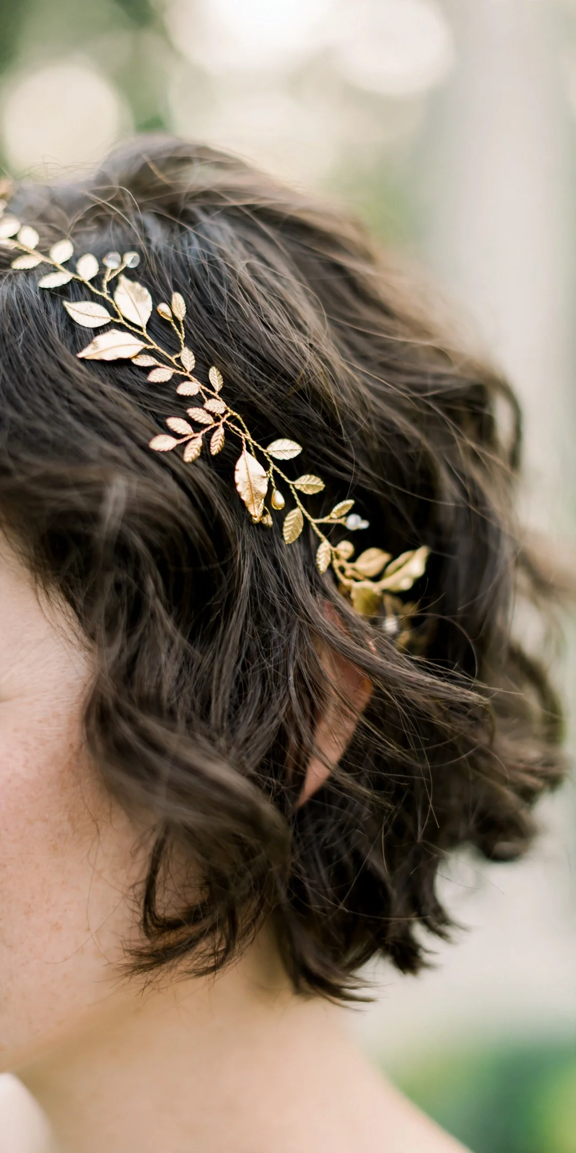 Gold leaf hair vine detail on short wavy bridal hair